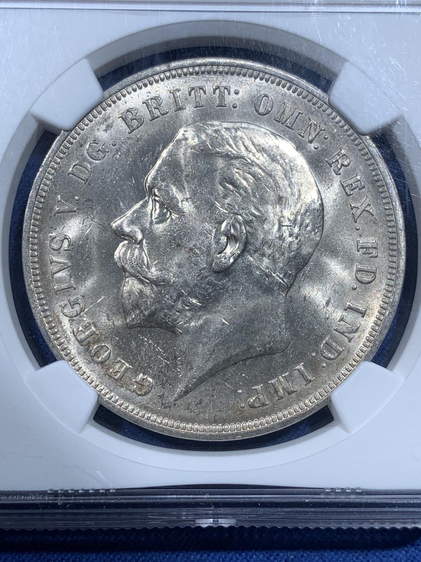 《竞宝斋》第482场 周日，周一 2场连拍 （全场包邮）20级店铺 欢迎送拍 NGC MS61 英国1935年乔治五世木马剑银币，爆霜感，整体状态很好，感觉低评了。