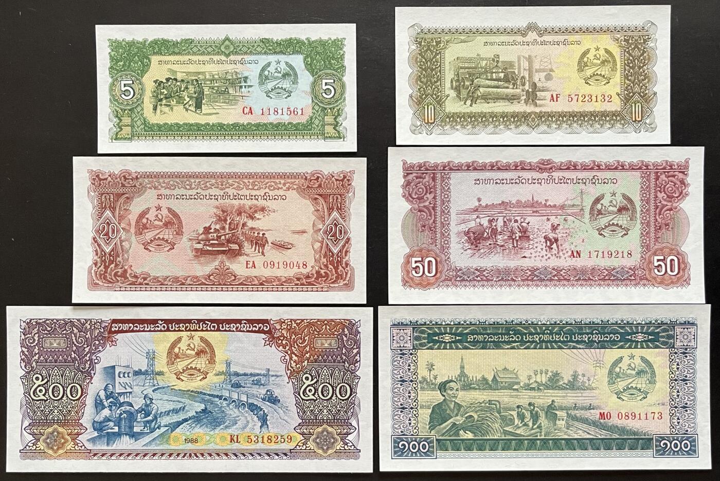 小福收藏拍卖第205期 裸钞场 本期有多张豹子号靓号  大量民国钞 百慕大样钞洋葱冠全套  阿富汗首年份查希尔国王和独立纪念碑 仅发行1000枚亚克力砖封蒙古20000图格里克帝国800周年纪念钞 卢旺达 东加勒比 斯里兰卡等多国精美纸币