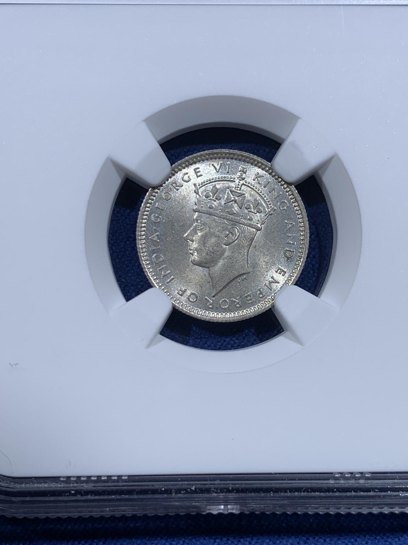 《竞宝斋》第482场 周日，周一 2场连拍 （全场包邮）20级店铺 欢迎送拍 NGC MS65 马来亚1941年乔六10分银币 少见卷拆BU状态，状态和分数都很难得