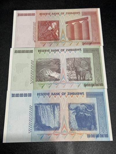 《外钞收藏家》第六百二十九期（精品场）（长期征集拍品、欢迎藏友们联系合作） 津巴布韦三张一起（含百万亿）全新UNC