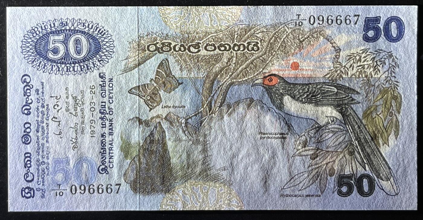 小福收藏拍卖第205期 裸钞场 本期有多张豹子号靓号  大量民国钞 百慕大样钞洋葱冠全套  阿富汗首年份查希尔国王和独立纪念碑 仅发行1000枚亚克力砖封蒙古20000图格里克帝国800周年纪念钞 卢旺达 东加勒比 斯里兰卡等多国精美纸币