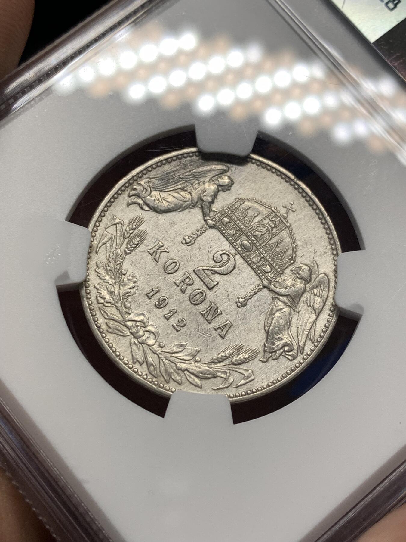 《竞宝斋》第482场 周日，周一 2场连拍 （全场包邮）20级店铺 欢迎送拍 NGC AUD 奥匈帝国1912年KB版双天使2克朗银币