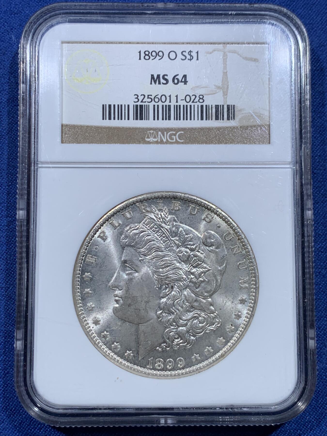 《竞宝斋》第482场 周日，周一 2场连拍 （全场包邮）20级店铺 欢迎送拍 NGC MS64 美国1899年O版摩根银币，老盒严评，十字光