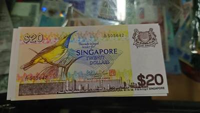 世界钱币～微拍第246期暨2026年第27期  少量老库存低价起拍 1979年新加坡鸟版20元 全新绝品尾号642