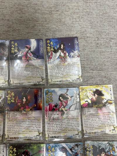 喜灰玩卡拍卖第八期，接拍品0佣金，欢迎送拍，释放现金流，让自己有资金可以购买更多喜欢的卡牌，让别的卡友能淘到更多心仪的卡牌 【限编】卡德曼 忠义水浒 谷粒老师绘 扈三娘 C版面 不重复 22张  全部带编