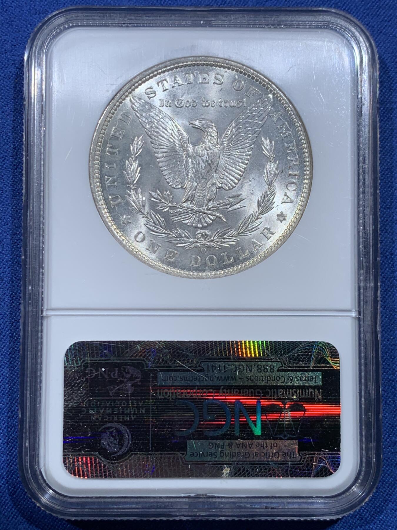 《竞宝斋》第482场 周日，周一 2场连拍 （全场包邮）20级店铺 欢迎送拍 NGC MS64 美国1899年O版摩根银币，老盒严评，十字光