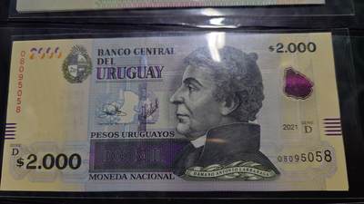 世界钱币～微拍第246期暨2026年第27期  少量老库存低价起拍 2021年乌拉圭2000比索 全新绝品无47尾号058