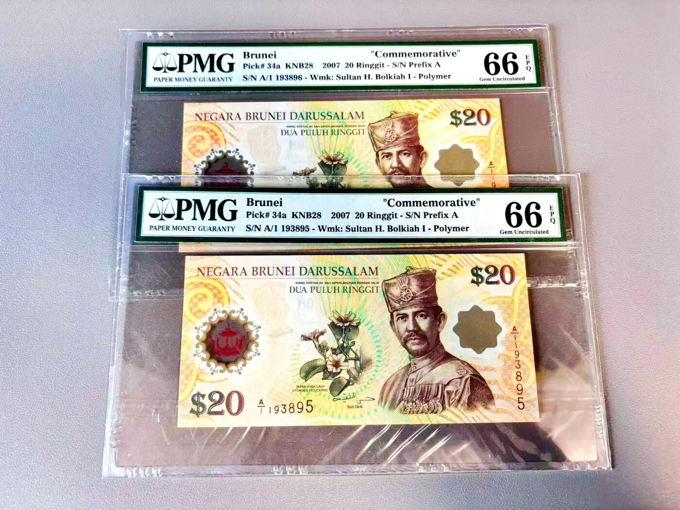 【Blue Auction】世界纸币精拍第812期——18级TOP拍卖/信誉/品质/专业/高效💫 【一组2张连号 A/1首发冠无47】文莱 2007年20林吉特 PMG66EPQ 