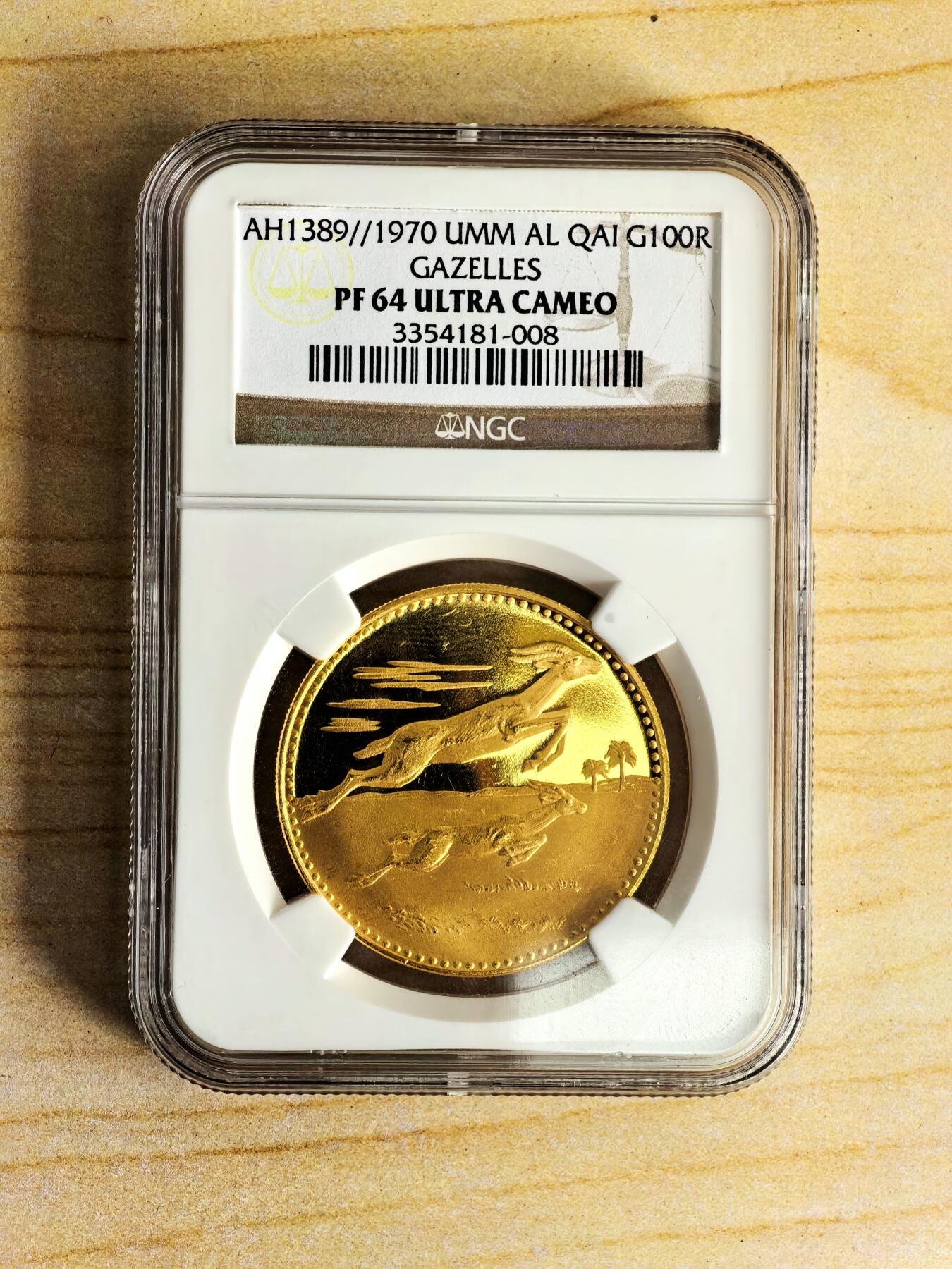 【Blue Auction】世界纸币精拍第812期——18级TOP拍卖/信誉/品质/专业/高效💫  阿联酋 乌姆盖万1970年100里亚尔金币 重20.73克 900金 NGC PF64 ULTRA CAMEO 深度镜面 