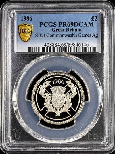 【雨安】【直播拍卖】【评级币章-132期】 2026-04-25 周六 19:30 (金价1050, 银价18.60)  [评级现代] Great Britain 英国 2镑 1986年 英联邦运动会 PCGS-PR69DCAM 精制币