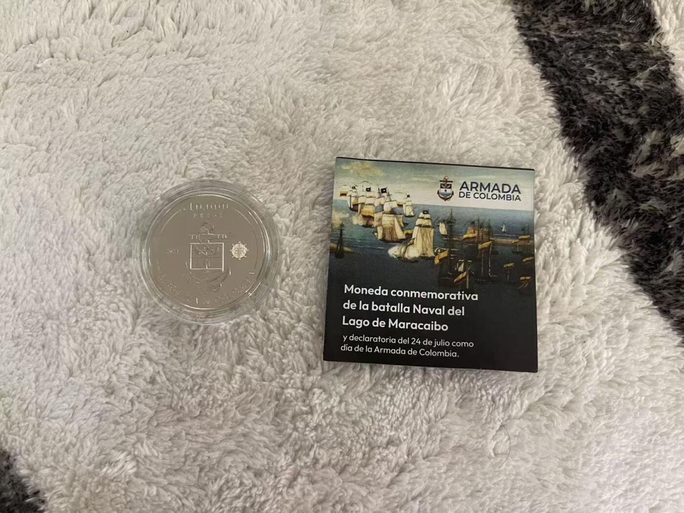 ❤️【币观天下】❤️ 第349期钱币拍卖场- 2026.4.24周五晚上6点半场 长期征集拍品  哥伦比亚2023年马拉开波湖海战纪念200周年铜镍纪念币 面值1W比索 含证书 