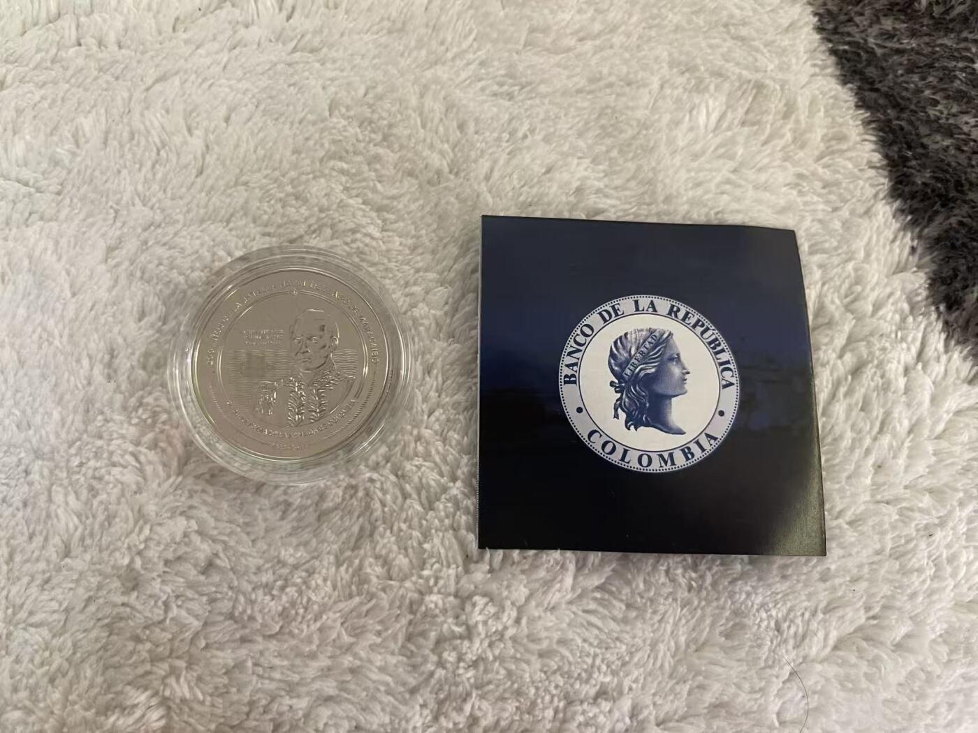 ❤️【币观天下】❤️ 第349期钱币拍卖场- 2026.4.24周五晚上6点半场 长期征集拍品  哥伦比亚2023年马拉开波湖海战纪念200周年铜镍纪念币 面值1W比索 含证书 