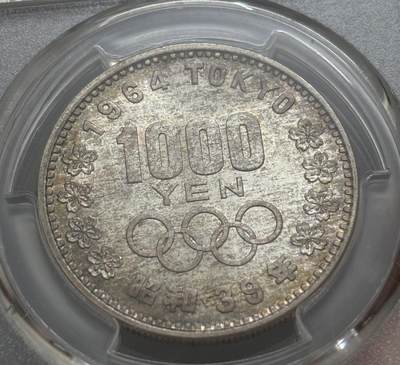 文馨钱币收藏第 303 场，【五一钱币荟，收藏盛宴】长期接代拍业务 PCGS MS67 日本 1964 年东京奥运会 1000 元纪念银币，原光朦胧彩包浆