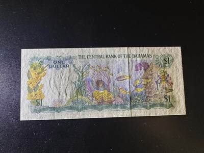 《外钞收藏家》第六百二十九期（精品场）（长期征集拍品、欢迎藏友们联系合作） 1974年巴哈马彩背女王1元 全新UNC