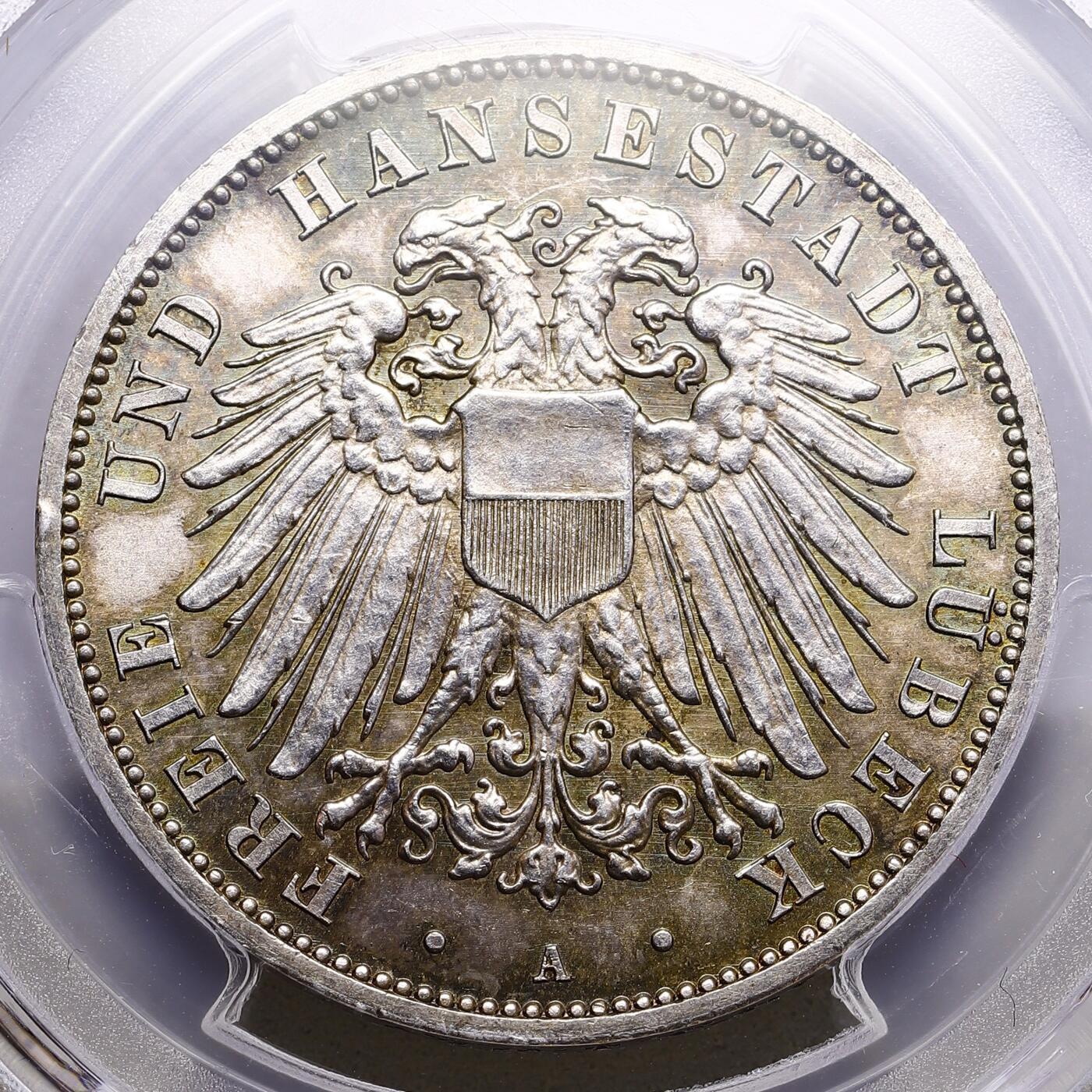 观钱 近现代机制币拍卖No.009（全场顺丰包邮，不区分偏远地区）  1910-A 德国吕贝克自由市 3 马克银币 PCGS MS65（双头鹰及背面帝国长翅鹰帅气精致，底板带金色彩包浆）