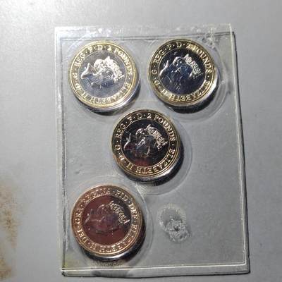 PCAI钱币  24-816  外国纸币与套币小专场 英国纪念币四枚 原封原光币