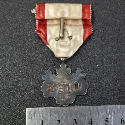 西秦中古拍卖第八十五期  不忘历史 抗战收藏 日本白色桐叶勋章 银制