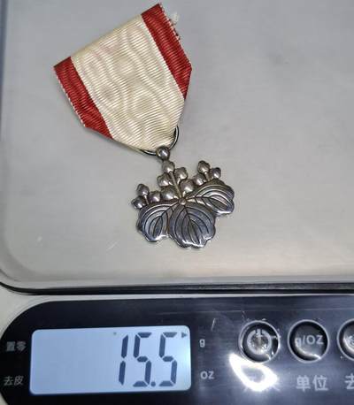 西秦中古拍卖第八十五期  不忘历史 抗战收藏 日本白色桐叶勋章 银制