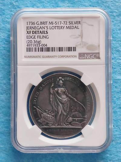 4月27日 🌏全球币章 - 稀品：1736年 英国（大不列颠）《杰尼根彩票》银章，NGC XF，银质20.36克，乔治二世时期发行，商业彩票配套赠品。正面为镌刻密涅瓦女神，铭文：双手竭诚，光耀不列颠。背面为卡罗琳王后，铭文：艺文昌盛，妆点帝国，纪年1736。