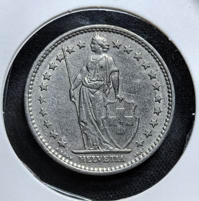 外国优质老铜币纪念币银币专场，周六晚上九点倒数截拍，满百包邮，节前出差在外，5月3日统一发货,可寄存半年，喜欢朋友微信扫描二维码可直接参拍 瑞士1969年2法郎，正面是象征瑞士的女神海尔维蒂亚，背面是面值与花环装饰，是瑞士中立政策下经济繁荣时期的货币见证。