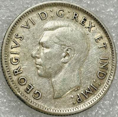 文馨钱币收藏第 302 场，国外回流老铜币，中东阿拉伯地区，拉美等国货币，30 号 1 号二连拍，长期接代拍业务，预计 4 月 4-5 号发货 带光好品 1942 年英属加拿大乔治六世 25 分银币，5.8 克 800 银