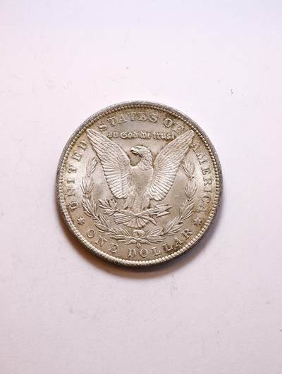 观钱 近现代机制币拍卖No.010（全场顺丰包邮，不区分偏远地区，本场5月5日开始发货）  美国  1884  摩根一元（新奥尔良厂）银币 未流通品相 转光丝绒 无严重流通磨损痕迹，摩根女神的发丝、花冠细节清晰，背面老鹰图案完整锐利，底板状态良好