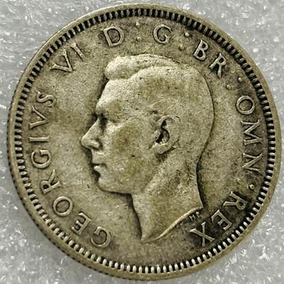 文馨钱币收藏第 302 场，国外回流老铜币，中东阿拉伯地区，拉美等国货币，30 号 1 号二连拍，长期接代拍业务，预计 4 月 4-5 号发货 1942 年英国乔治六世 1 先令银币，5.6 克 500 银