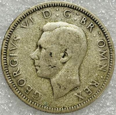 文馨钱币收藏第 302 场，国外回流老铜币，中东阿拉伯地区，拉美等国货币，30 号 1 号二连拍，长期接代拍业务，预计 4 月 4-5 号发货 1942 年英国乔治六世 1 先令银币，5.6 克 500 银