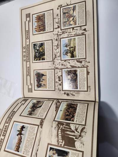 南水社第5次拍卖  魏玛德国时期 稀少第一次世界大战专题香烟卡收藏册《Der Weltkrieg》（《世界大战》） 全册完整无缺保持完好 德累斯顿“Cigaretten-Bilderdienst Dresden”官方发行 全套彩色烟卡 含战场场景、武器装备、各国军队、政治人物及战争地图 附完整文字说明 