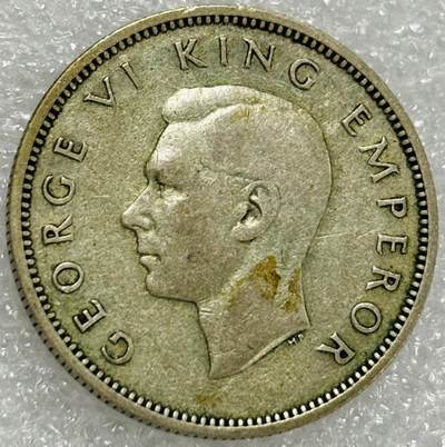 文馨钱币收藏第 302 场，国外回流老铜币，中东阿拉伯地区，拉美等国货币，30 号 1 号二连拍，长期接代拍业务，预计 4 月 4-5 号发货 1944 年英属新西兰乔治六世 1 先令银币，5.6 克 500 银