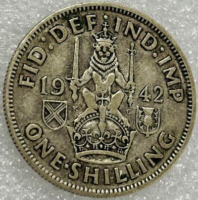 文馨钱币收藏第 302 场，国外回流老铜币，中东阿拉伯地区，拉美等国货币，30 号 1 号二连拍，长期接代拍业务，预计 4 月 4-5 号发货 1942 年英国乔治六世 1 先令银币，5.6 克 500 银