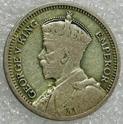 文馨钱币收藏第 302 场，国外回流老铜币，中东阿拉伯地区，拉美等国货币，30 号 1 号二连拍，长期接代拍业务，预计 4 月 4-5 号发货 1933 年英属新西兰乔治五世 3 便士银币，1.4 克 500 银，首发年