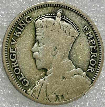 文馨钱币收藏第 302 场，国外回流老铜币，中东阿拉伯地区，拉美等国货币，30 号 1 号二连拍，长期接代拍业务，预计 4 月 4-5 号发货 1935 年英属新西兰乔治五世 3 便士银币，2.8 克 500 银