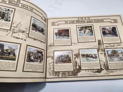 南水社第5次拍卖  魏玛德国时期 稀少第一次世界大战专题香烟卡收藏册《Der Weltkrieg》（《世界大战》） 全册完整无缺保持完好 德累斯顿“Cigaretten-Bilderdienst Dresden”官方发行 全套彩色烟卡 含战场场景、武器装备、各国军队、政治人物及战争地图 附完整文字说明 