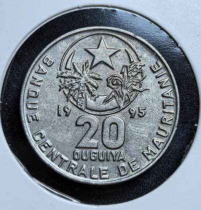 外国优质老铜币纪念币银币专场，周六晚上九点倒数截拍，满百包邮，节前出差在外，5月3日统一发货,可寄存半年，喜欢朋友微信扫描二维码可直接参拍 毛里塔尼亚20乌吉亚，币面饰有星月、麦穗与棕榈图案，象征伊斯兰信仰与农牧经济，是该国独立后巩固主权、发展民族货币体系的见证。