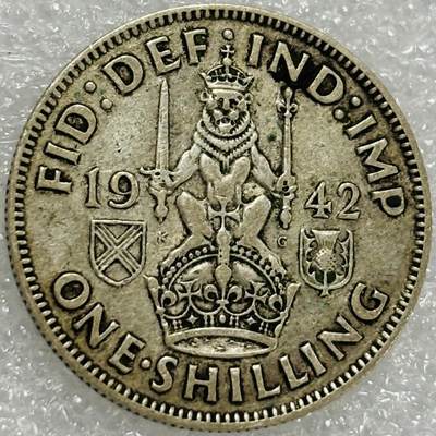 文馨钱币收藏第 302 场，国外回流老铜币，中东阿拉伯地区，拉美等国货币，30 号 1 号二连拍，长期接代拍业务，预计 4 月 4-5 号发货 1942 年英国乔治六世 1 先令银币，第二版 5.6 克 500 银