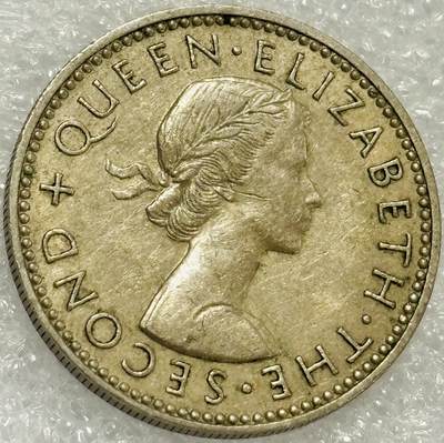 文馨钱币收藏第 302 场，国外回流老铜币，中东阿拉伯地区，拉美等国货币，30 号 1 号二连拍，长期接代拍业务，预计 4 月 4-5 号发货 好品 1957 年英属新西兰 1 先令