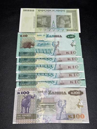 《外钞收藏家》第六百三十一期（五一假期场）（长期征集拍品、欢迎藏友们联系合作） 津巴布韦1张+赞比亚10和100面额6张 一起 全新UNC