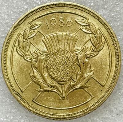 文馨钱币收藏第 302 场，国外回流老铜币，中东阿拉伯地区，拉美等国货币，30 号 1 号二连拍，长期接代拍业务，预计 4 月 4-5 号发货 原铜光好品英国1986年2镑 废除奴隶制 双金属 纪念币 