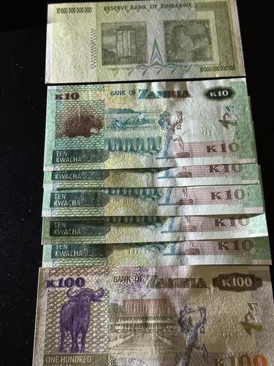 《外钞收藏家》第六百三十一期（五一假期场）（长期征集拍品、欢迎藏友们联系合作） 津巴布韦1张+赞比亚10和100面额6张 一起 全新UNC