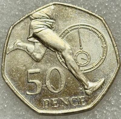 文馨钱币收藏第 302 场，国外回流老铜币，中东阿拉伯地区，拉美等国货币，30 号 1 号二连拍，长期接代拍业务，预计 4 月 4-5 号发货 好品英国2004年50便士 雅典奥运会田径纪念币 