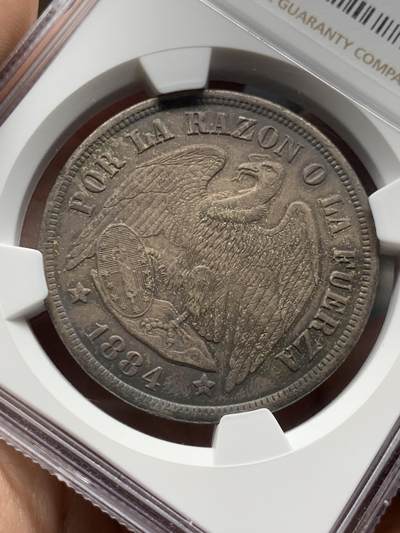 《竞宝斋》第484场 周日，周一，周二 3场连拍 （全场包邮）20级店铺 欢迎送拍 NGC MS61 智利1884SO大银币，低评了，品种常见状态好，纯正欧洲纸袋包浆。