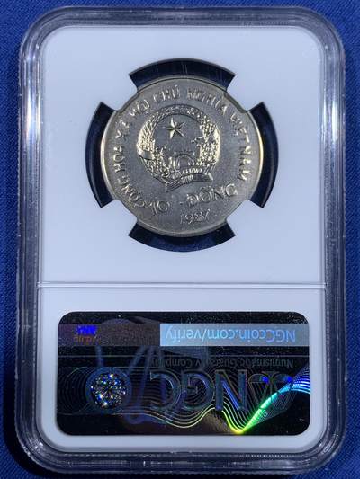 《竞宝斋》第484场 周日，周一，周二 3场连拍 （全场包邮）20级店铺 欢迎送拍 NGC MS66 越南1987年10DONG婆罗洲红毛猩猩镍币，币面除猩猩外还有WWF世界自然基金会熊猫