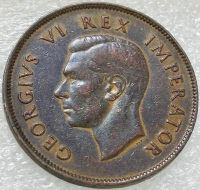 文馨钱币收藏第 302 场，国外回流老铜币，中东阿拉伯地区，拉美等国货币，30 号 1 号二连拍，长期接代拍业务，预计 4 月 4-5 号发货 彩色紫罗兰 1943 年英属南非乔治六世 1 便士铜币