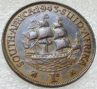 文馨钱币收藏第 302 场，国外回流老铜币，中东阿拉伯地区，拉美等国货币，30 号 1 号二连拍，长期接代拍业务，预计 4 月 4-5 号发货 彩色紫罗兰 1943 年英属南非乔治六世 1 便士铜币