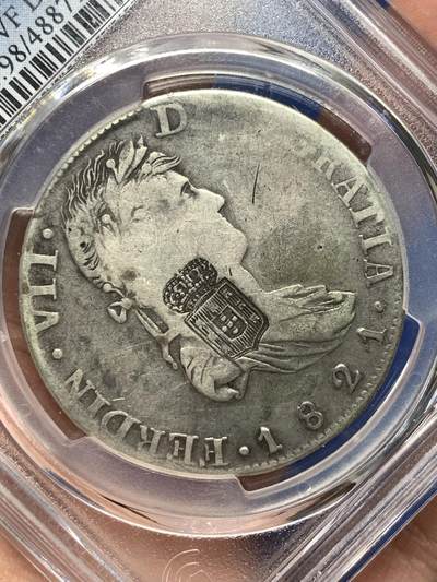 《竞宝斋》第484场 周日，周一，周二 3场连拍 （全场包邮）20级店铺 欢迎送拍 PCGS F Details Rrpaired 葡萄牙 1834年 加盖改870R银币，加盖于墨西哥1821年费七双柱上。戳记清晰完整。稀少品种，无分性价比很高。