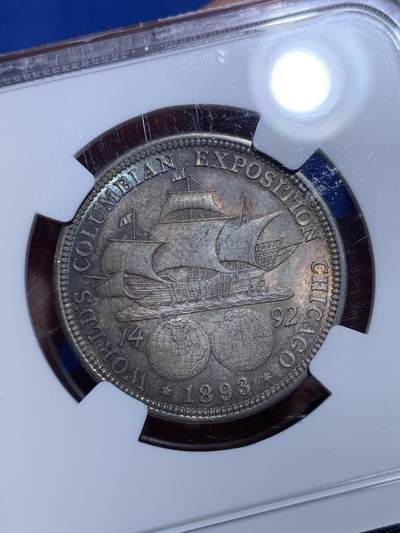 《竞宝斋》第484场 周日，周一，周二 3场连拍 （全场包邮）20级店铺 欢迎送拍 NGC MS64 美国 1893年 哥伦布半美元纪念银币 双面蓝彩包浆 状态极美。近期有同品种62分不含佣成交价即达到800元以上