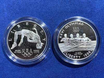 《竞宝斋》第484场 周日，周一，周二 3场连拍 （全场包邮）20级店铺 欢迎送拍 美国1996年亚特兰大百年奥运会系列-划船和跳高1美元2枚精制银币套 26.73克900银X2 盒证全