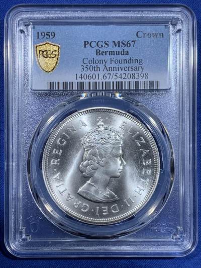 《竞宝斋》第484场 周日，周一，周二 3场连拍 （全场包邮）20级店铺 欢迎送拍 PCGS MS67 英属百慕大群岛1959年伊丽莎白二世1克朗纪念银币，币面清爽干净又舒适，转光强烈细节优秀，状态一流。