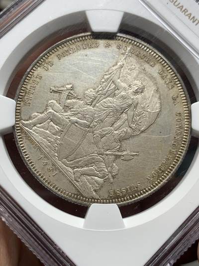 《竞宝斋》第484场 周日，周一，周二 3场连拍 （全场包邮）20级店铺 欢迎送拍 NGC UNC 瑞士1881年弗莱堡射击节5法郎大银币，景观刻画细致。